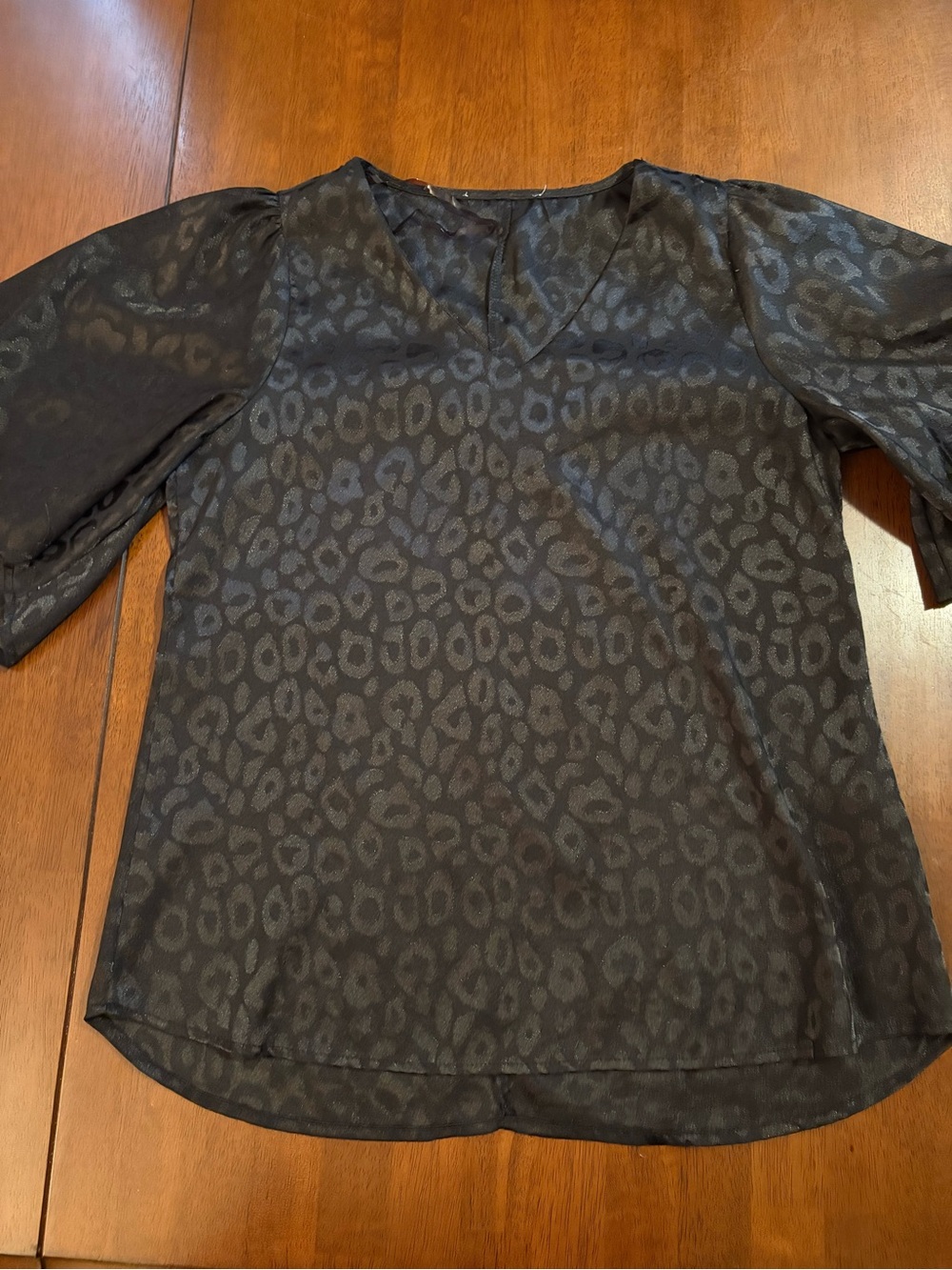 Women's Black Animal-Print V-Neck Blouse